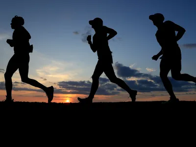 Runners in Hawaii exercise at sunset. Exercise has profound effects on brain structure and provides more subtle mental health benefits as well.