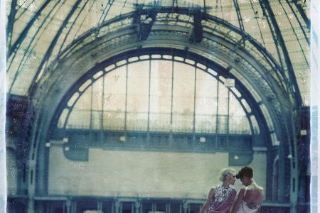 Cathleen Naundorf’s signature style celebrates the Grand Palais’ dramatic design and the “sculptural” details of two dresses from Chanel’s 2010 collection.
