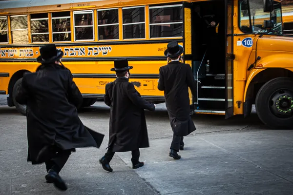 Hasidic Jewish Schoolboys Board a Bus in South Williamsburg thumbnail