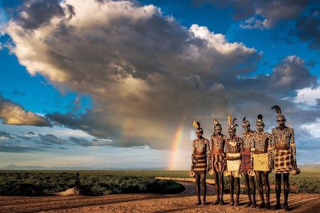  Karo warriors, Omo Valley, Ethiopia. "Five warriors show off their gorgeous body painting and the ostrich plumes sticking out of their headplates, distinguishing adornments of their culture."