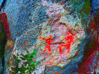 Images of human figures are visible in the Bronze Age paintings.