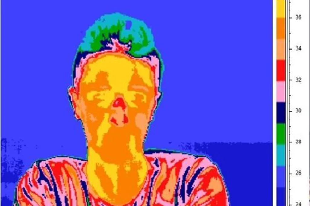 A thermal image of a lying subject gives away his bright red nose.