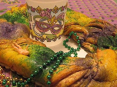 The king cake—with the ensconced plastic baby—is the classic Mardi Gras dessert.