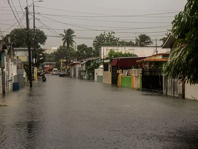 A flooded road in Villa Blanca, Puerto Rico, on Sept. 18, 2022 due to Hurricane Fiona.&nbsp;