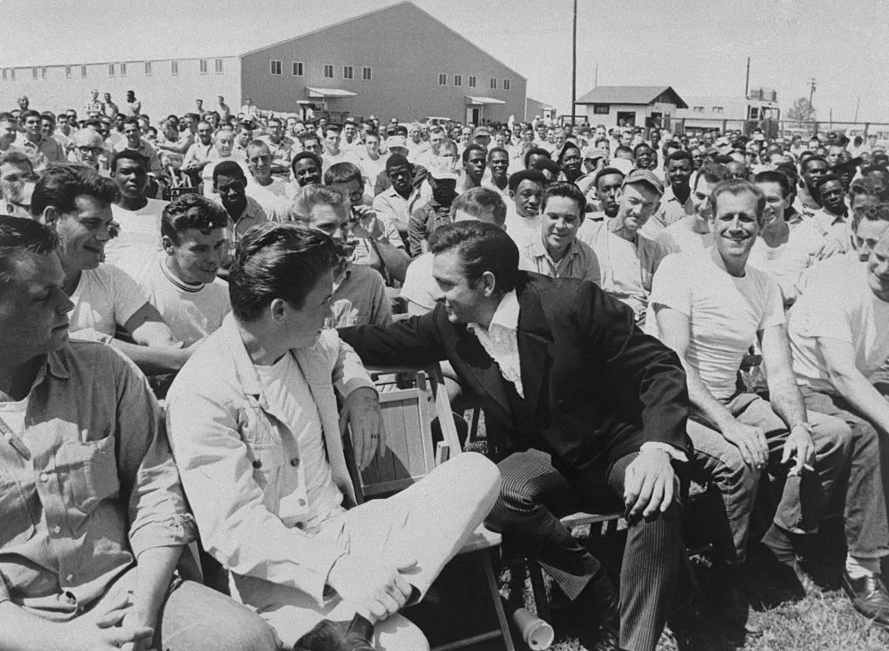 Johnny Cash chats with inmates at Cummins Prison in 1969