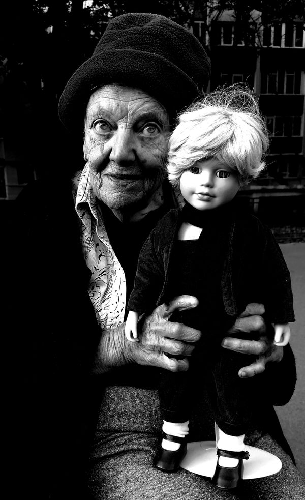 The old woman and her porcelain doll thumbnail