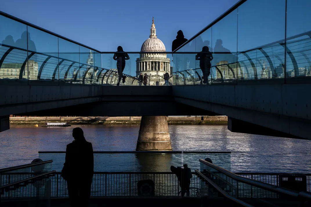 13 - Two very important landmarks in London, the Millennium Bridge in the foreground and St. Paul’s Cathedral in the background, represent the modern-day and centuries-old attractions of the historic city.