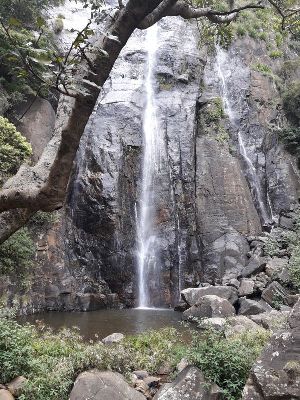 Drizzling onto the rocks, the highest waterfall of Sri Lanka. thumbnail