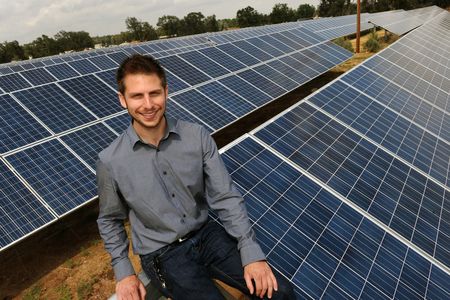 David Amster-Olszewski, founder of SunShare, at one of the "solar gardens" his company built in Colorado