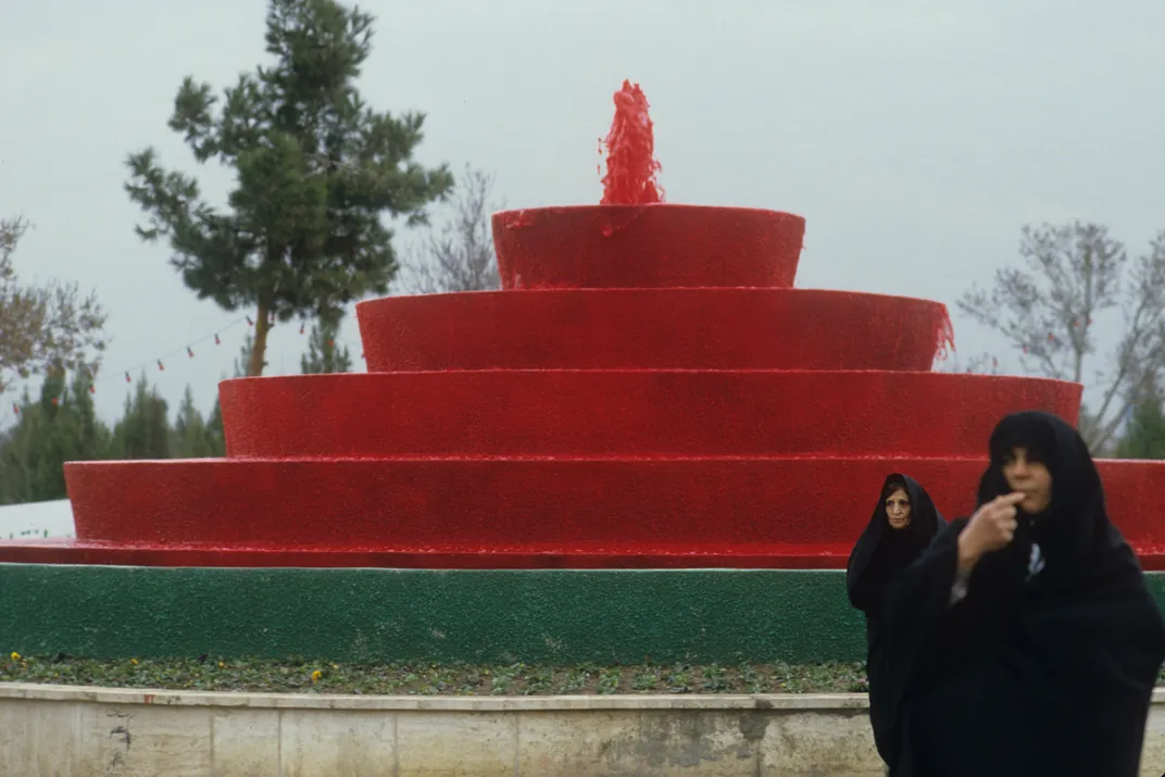 The Behesth-e Zahra cemetery in 1984, where a fountain was dyed with red to represent the blood of those killed in the Iran-Iraq war