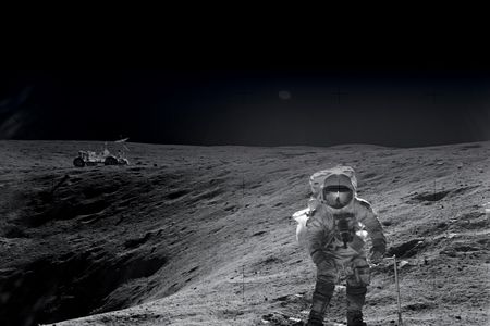 On their first Apollo 16 moonwalk, John Young and Charlie Duke (pictured) made their way to a crater named Plum. Their lunar rover waits in the background. Duke remembers the rover ride as bumpy, but stable.