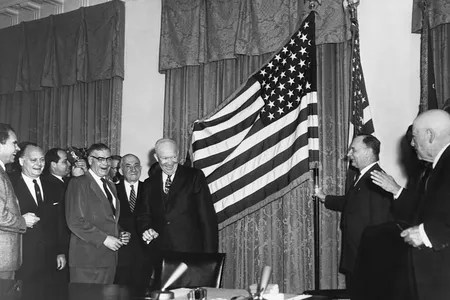 President Dwight D. Eisenhower enthusiastically declares Alaska statehood on January 3, 1959.