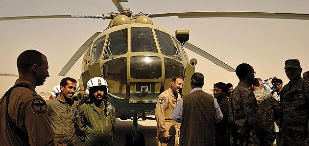 At Kandahar airfield, Afghans and Western coalition members celebrate the activation of the Afghan air force’s second wing.