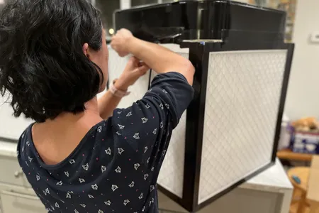 Building a Corsi-Rosenthal box portable air filter comes down to duct-taping together a set of furnace filters and a box fan.