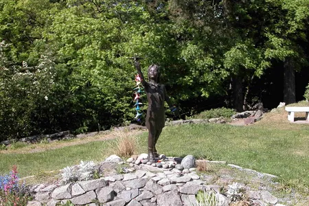 The five-foot-tall bronze statue was installed in Peace Park in the '90s.