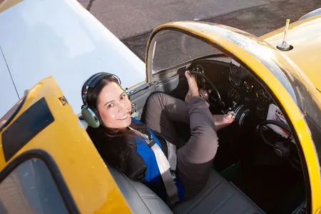Jessica Cox sitting in her Ercoupe.