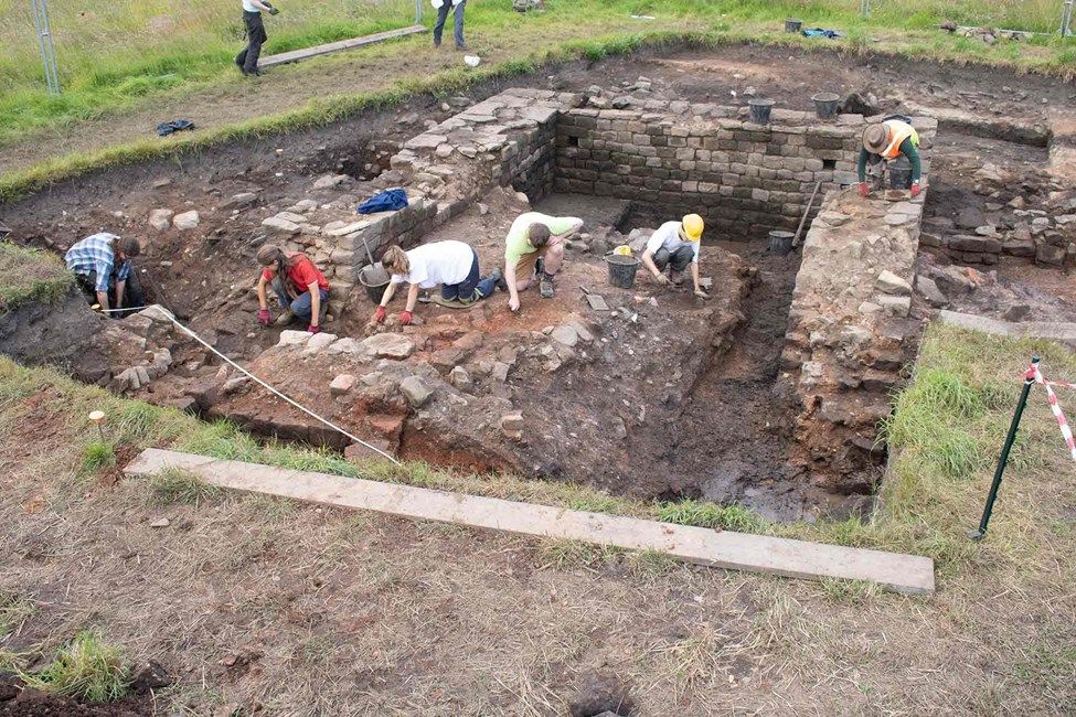 Students from Newcastle University excavate the Birdoswald bathhouse.