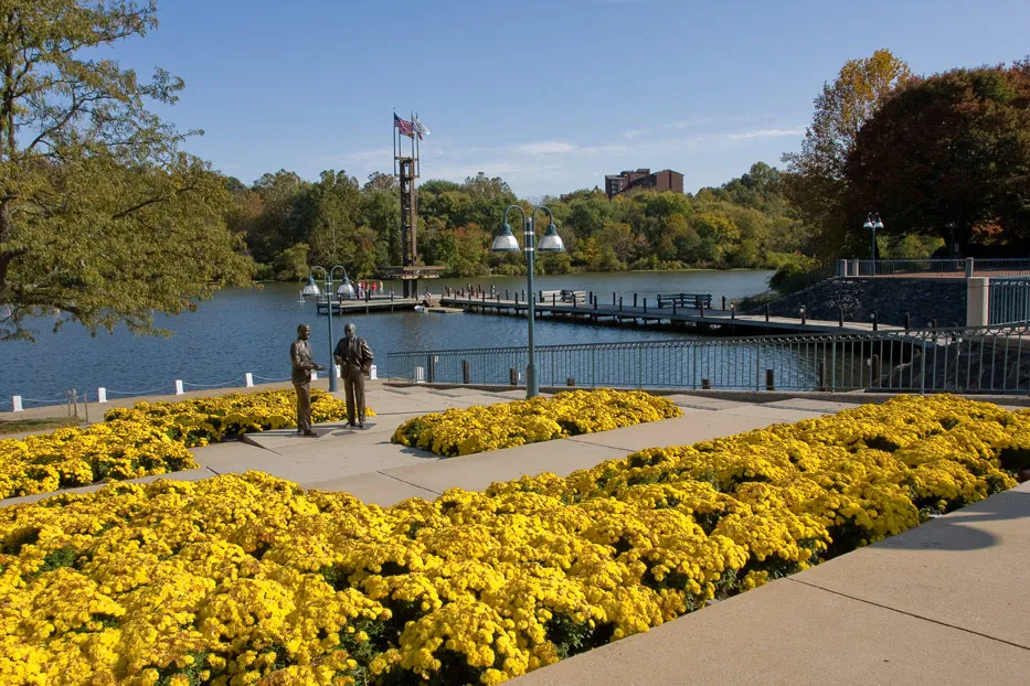 Columbia, today. Statues of Willard Rouse and James W. Rouse stand on the shore of Lake Kittamaqundi. 