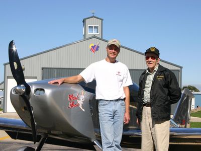 The author with Bill Brennand and Metal Illness, his homebuilt Sonex, in Oshkosh, 2007. 