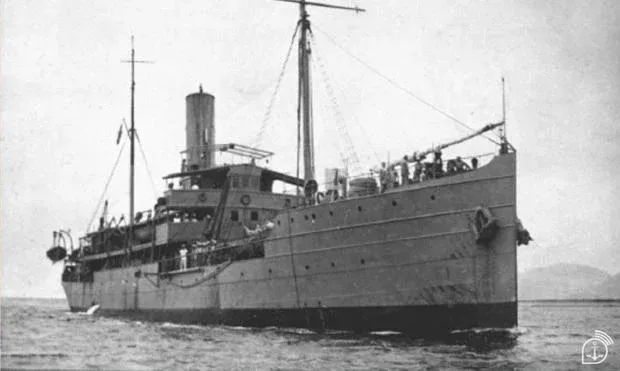 Black and white photo of a large ship on water