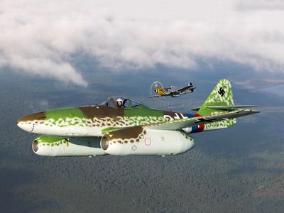 An Me 262 replica flees a Mustang