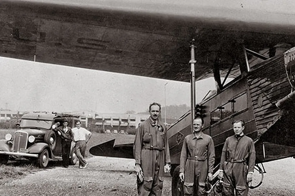Captain Carl Crane, who invented the autoland system, Captain George Holloman, and engineer Raymond Stout