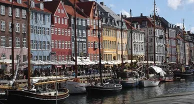 Glamorous sailboats fill Copenhagen's canal.