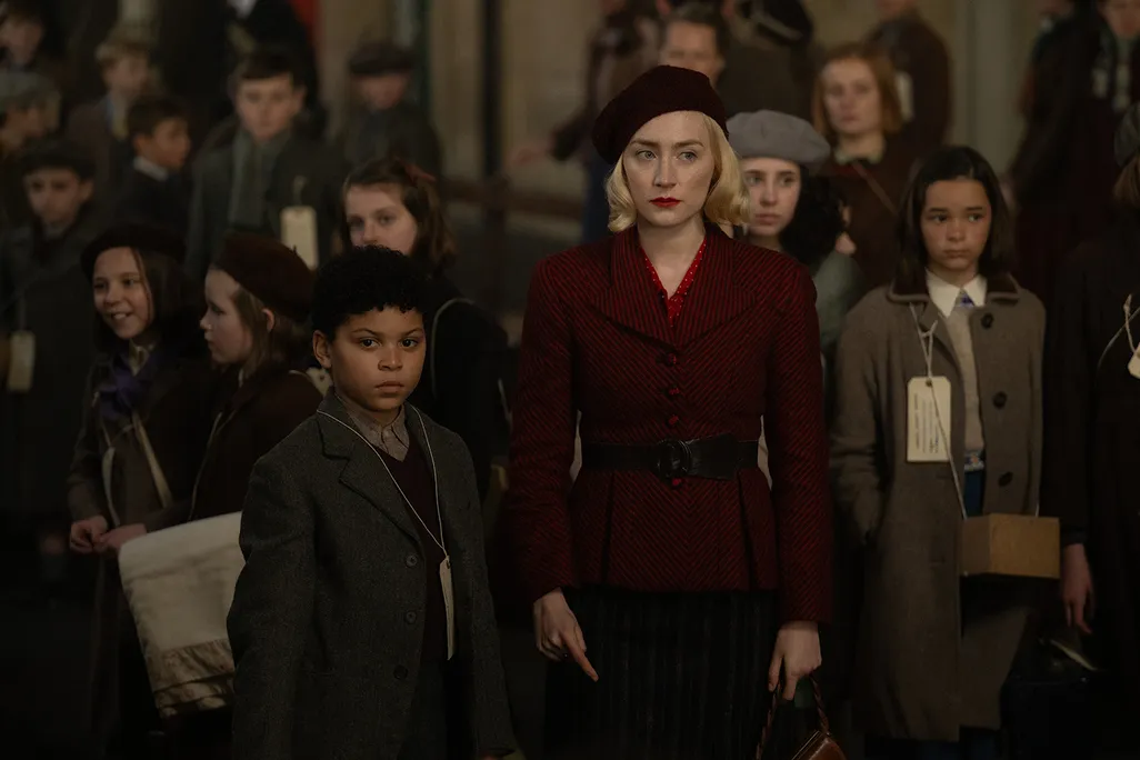 Elliot Heffernan (left) and Saoirse Ronan (right) in Steve McQueen's "Blitz"