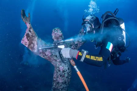 Located nearly 60 feet below the surface, the statue is cleaned every year.