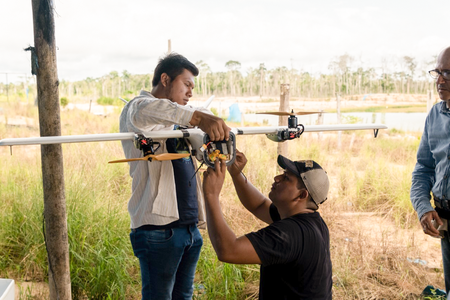 In the Peruvian Amazon, drones like this one are being used to monitor and prevent future destruction of the rainforest from artisanal gold mining. Photo by Guy Loftus for Conservation X Labs.