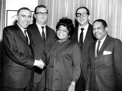 Vivian Carter (center) and her husband, Jimmy Bracken (far right), launched Vee Jay Records in 1953.