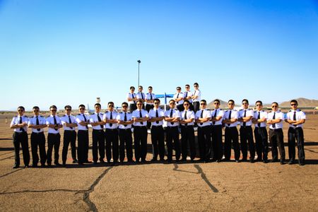 TransPac Aviation Academy's February 2015 graduating class, in character. The Arizona flight school's student body is roughly 80 percent Chinese. 