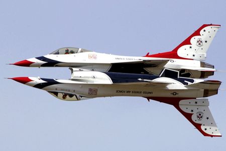NELLIS AIR FORCE BASE, Nev. -- Thunderbird solo pilots teamed up to perform their trademark calypso pass.  (U.S. Air Force photo by Tech. Sgt. Sean M. White)