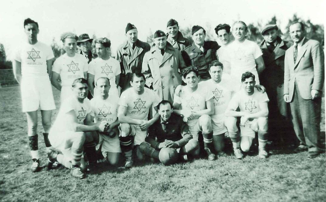 Football team photo at displaced persons camp in Germany