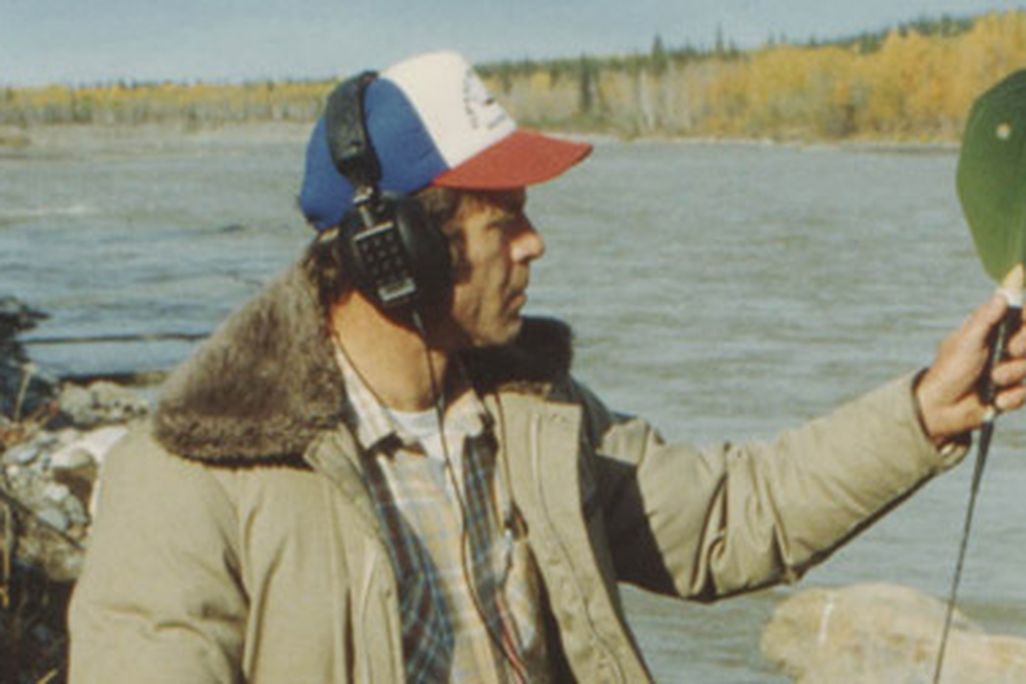 A biologist with a salmon tracking device