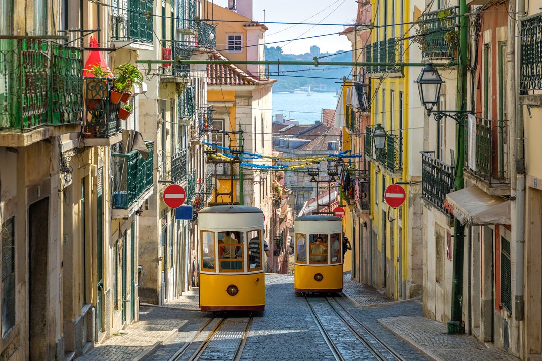 Trams climbing the hills of Lisbon