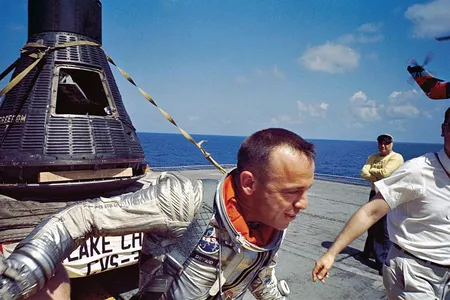 Shepard safely back on the deck of USS Lake Champlain after his 15-minute flight.