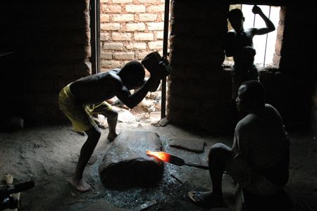 Lead curator Tom Joyce traveled to Mali, Burkina Faso, Ghana, the Republic of Bénin and Togo (above: blacksmiths Kao Kossi and Ide Essozimna) to conduct research, film a half-dozen videos and help amass the 225 objects in the show.
