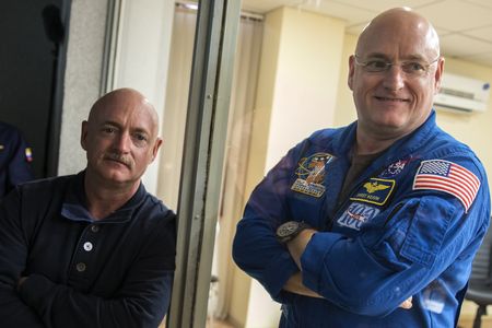 U.S. astronaut Scott Kelly (right) and his twin brother Mark attend a press conference ahead of NASA's "Year in Space" mission at the Baikonur Cosmodrome in Kazakhstan in 2015.