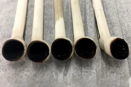 Researchers used these five replica clay pipes to "smoke" tobacco and other native plants.

