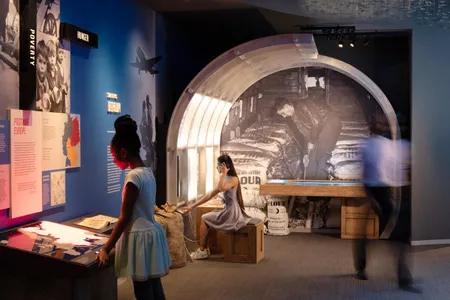 Visitors explore during a sneak preview of the newly renovated Harry S. Truman Presidential Museum and Museum in Independence, Missouri. The $29 million expansion took 2 years to complete. 