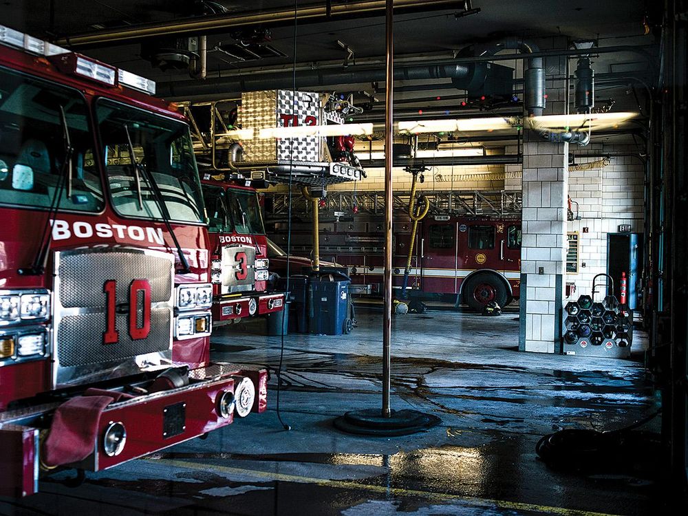 Firetruck and fire pole in Boston fire station