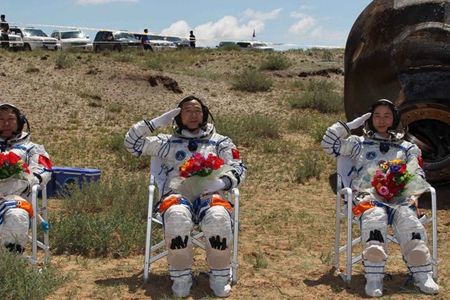 The Shenzhou-9 crew shortly after landing in Inner Mongolia on June 29, 2012.