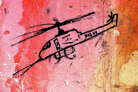 Drawing of a helicopter on a wall of a house located at the first American helicopter crash site in Mogadishu. The Somali word on the helicopter's side, kulva, is an attempt to spell the word "Cobra," which was one kind of helicopter used to attack the village.