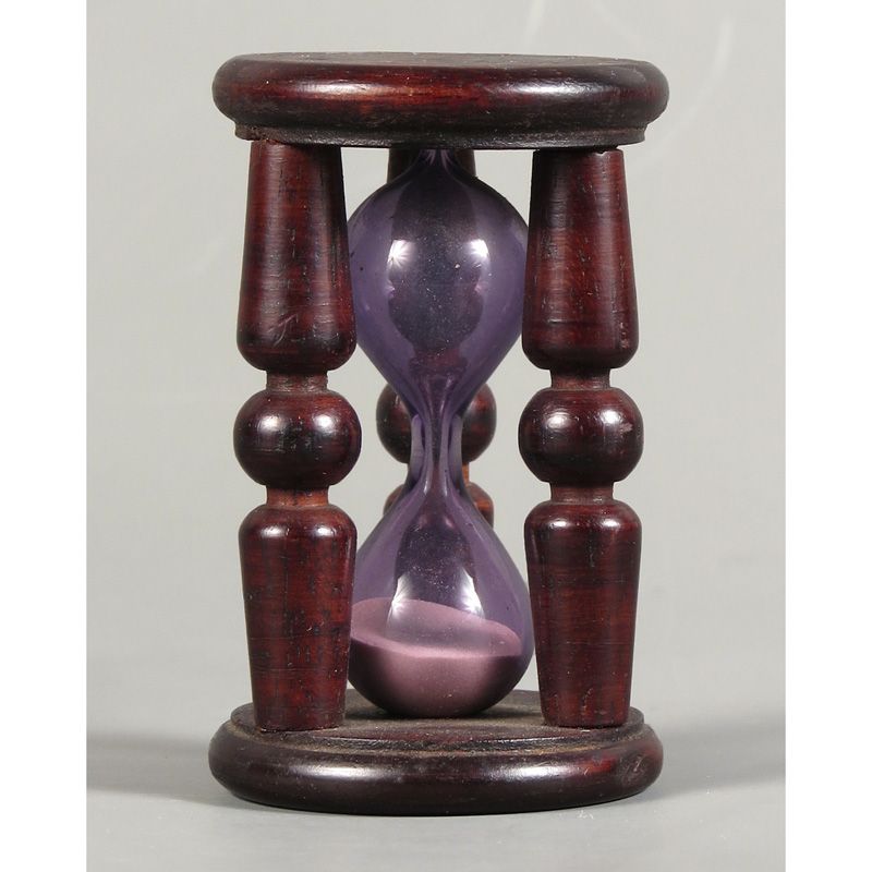 Carved wooden hourglass