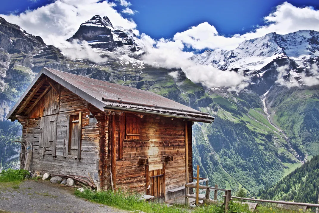 A rustic, cliffside cabin