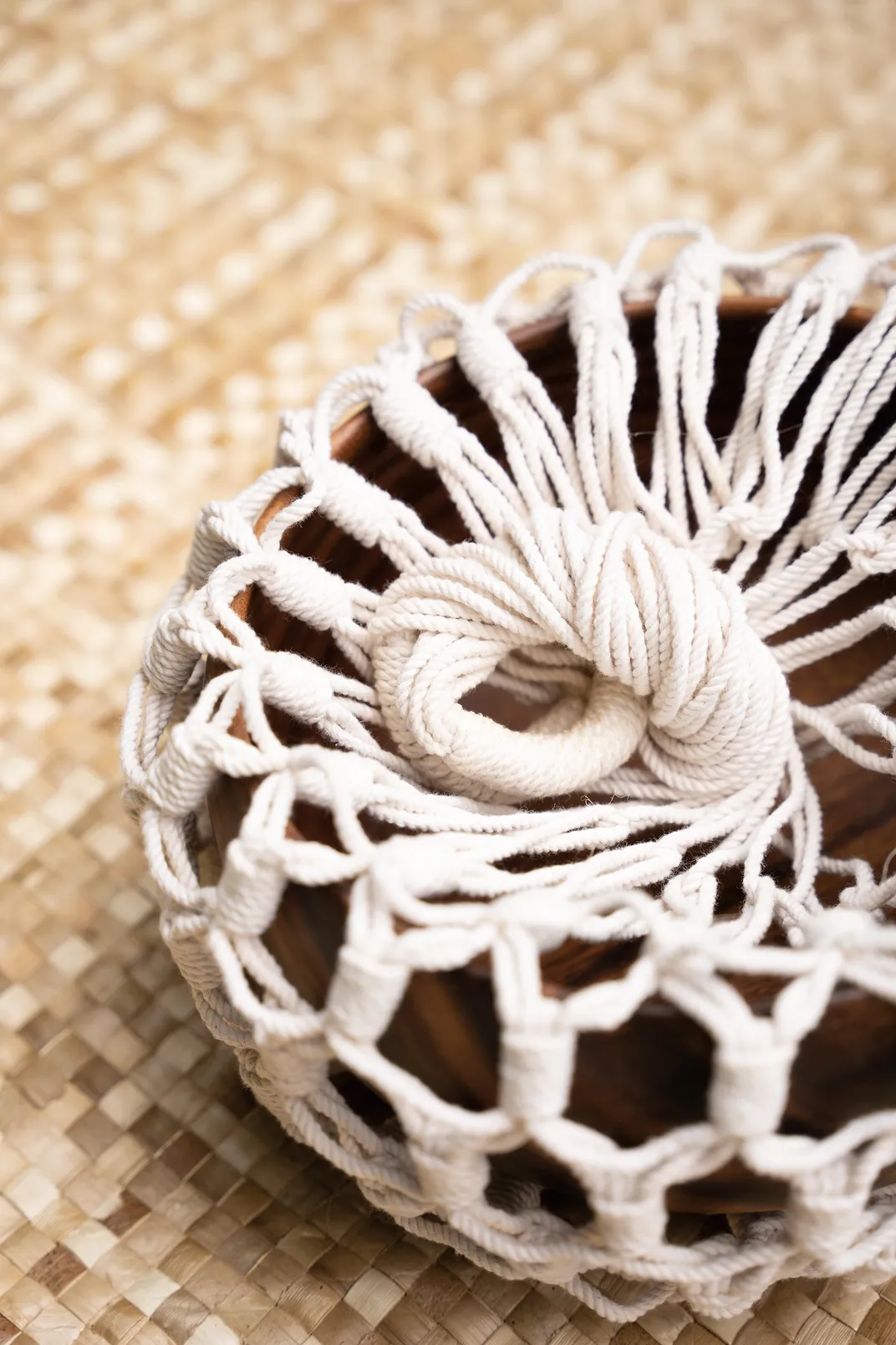 a hand weaved hanging basket