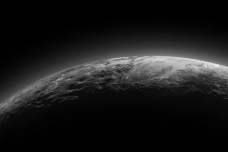 An image from the New Horizons satellite showing three officially named features on Pluto: Norgay Montes, Hillary Montes and Sputnik Planitia