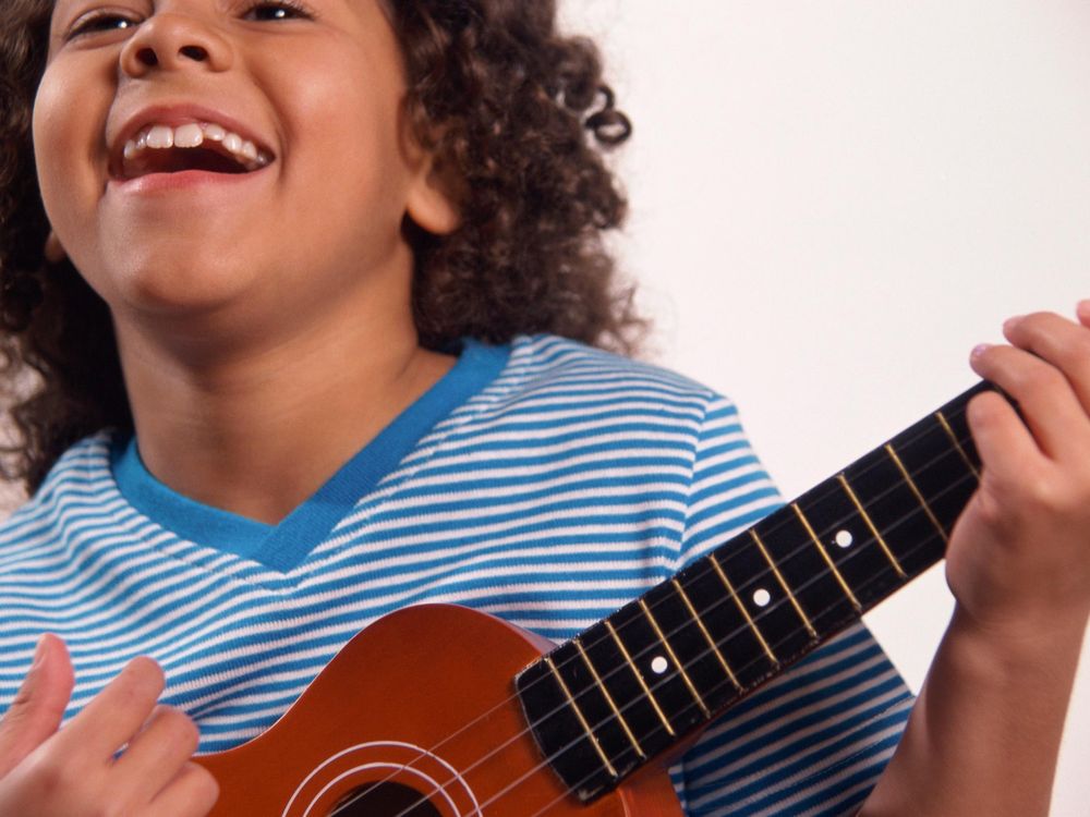 Kid With Ukulele