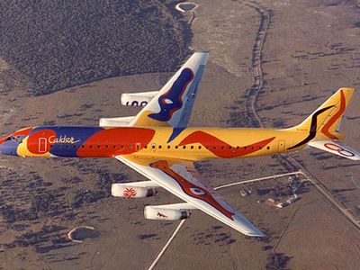 Braniff International&#39;s McDonnell Douglas DC-8-62 &quot;Flying Colors&quot; in flight, 1973.